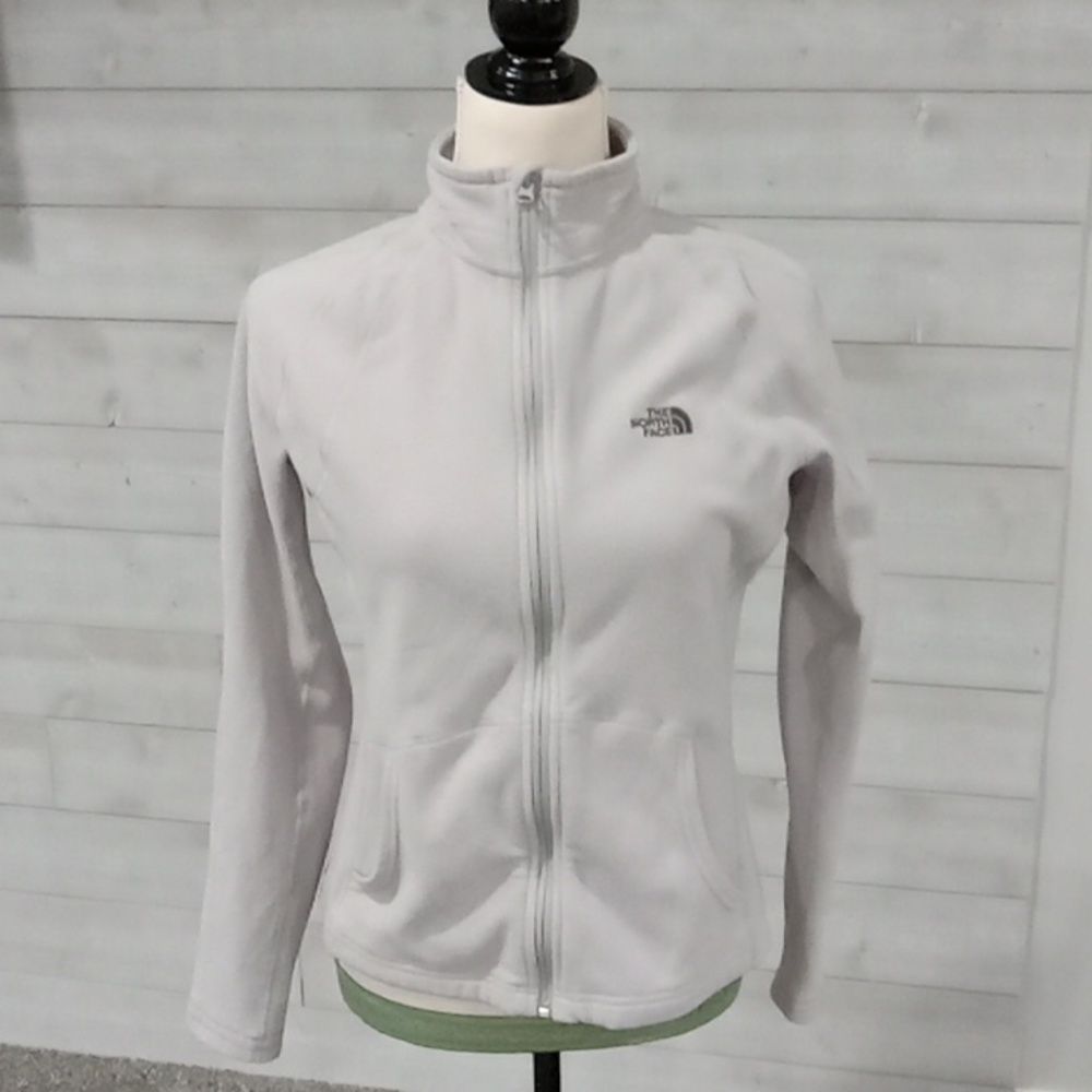 The North Face Gray zip up jacket with 2 front open pockets size Small.